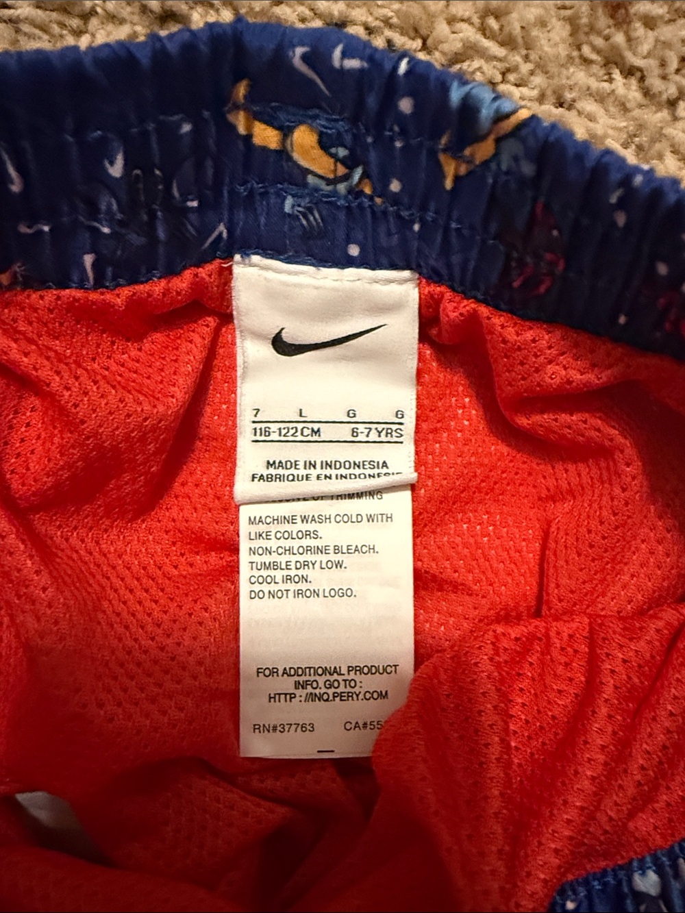 Nike Blue Swim Trunks with Red & Yellow Shark Motif - Picture 2 of 4